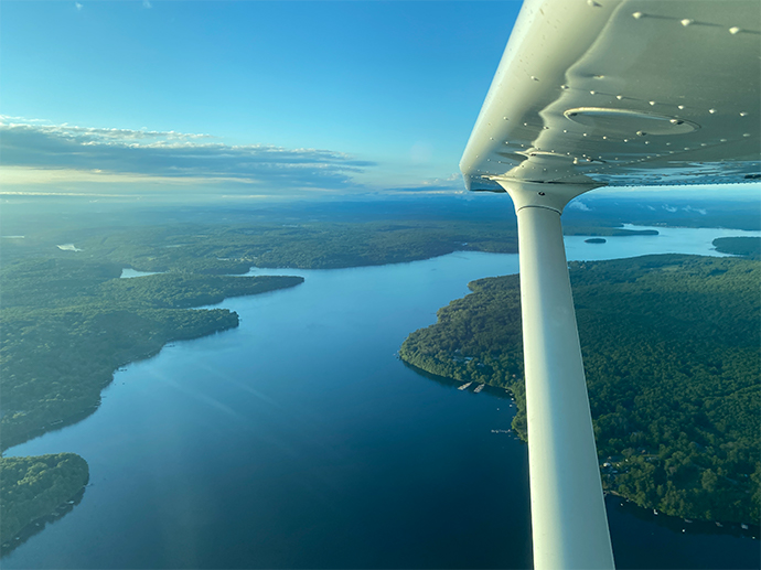 Lake Wallenpaupack Air Tour. Wallenpaupack lake at the center of the image. View from the airplane from Hop On Air airplane tour.